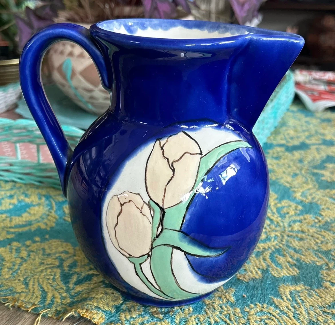 Blue Pitcher with Floral Design