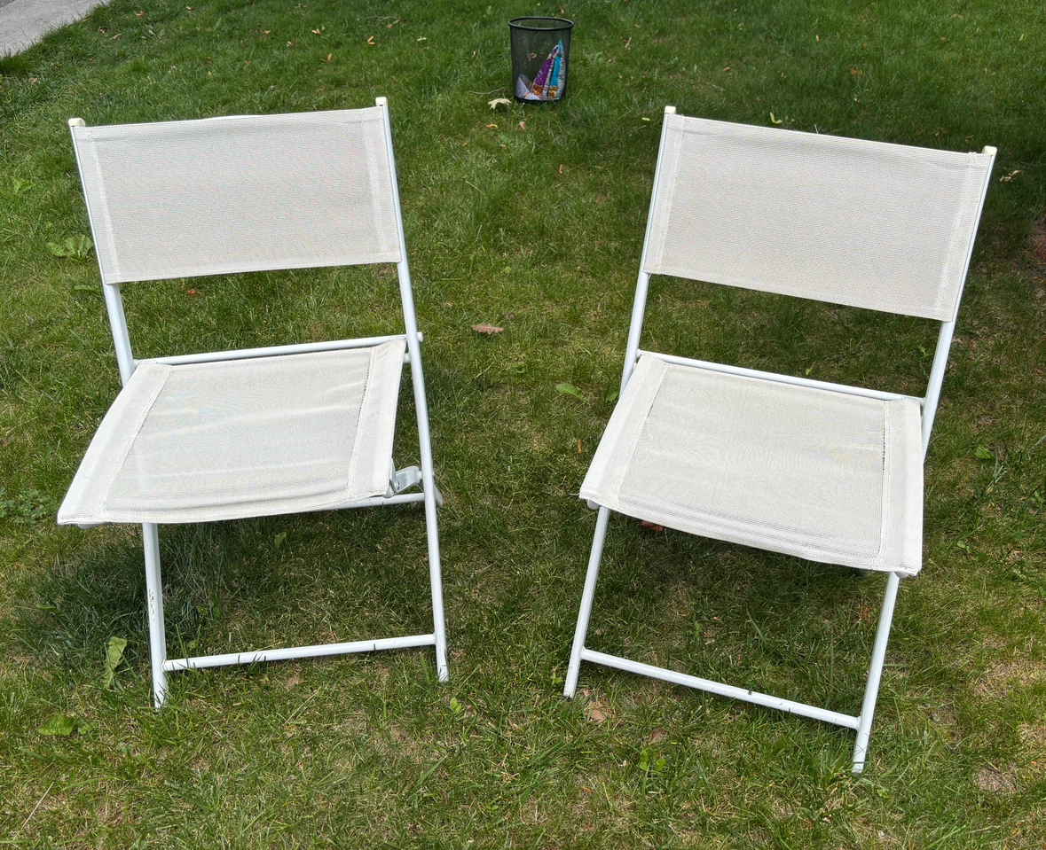 Pair of beautiful white folding chairs