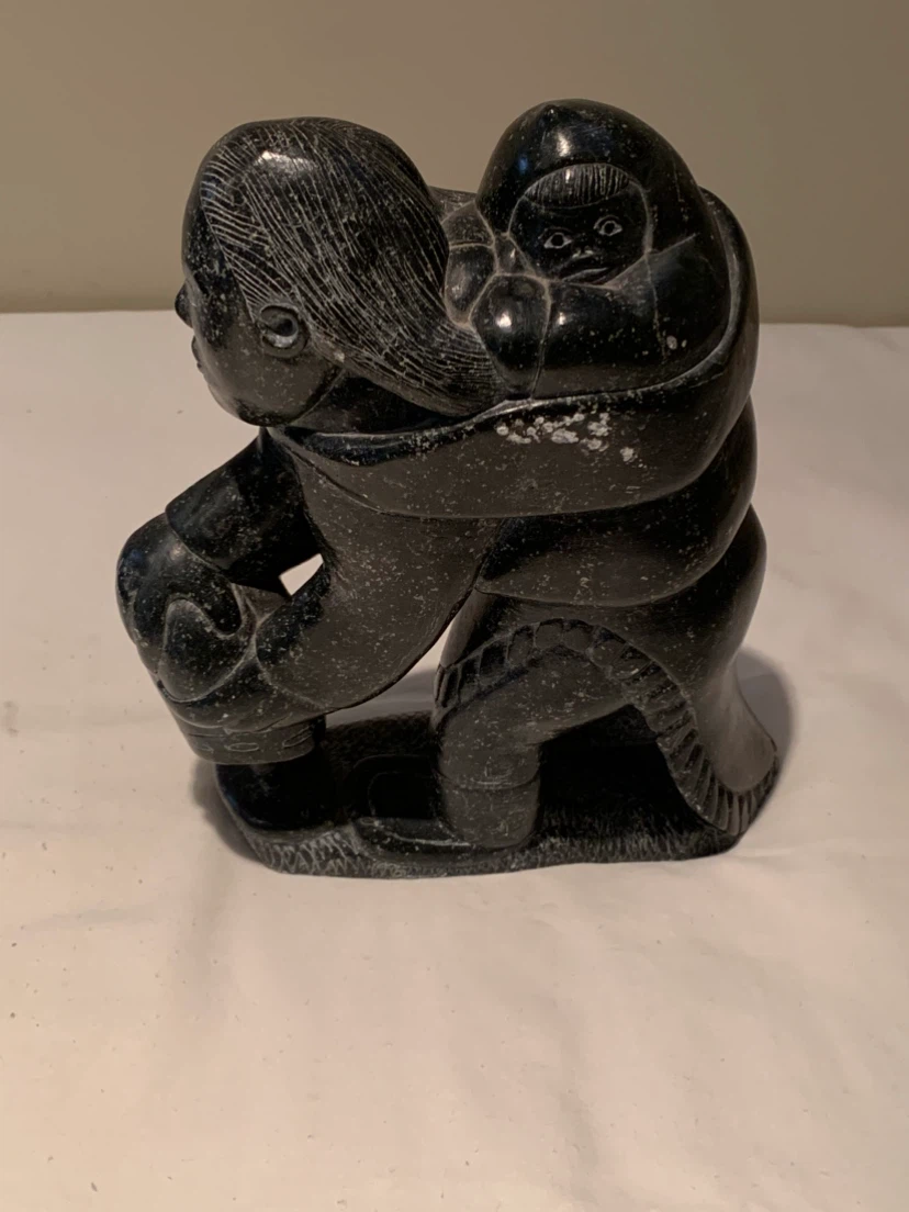 Carved Stone Sculpture of Mother and Child