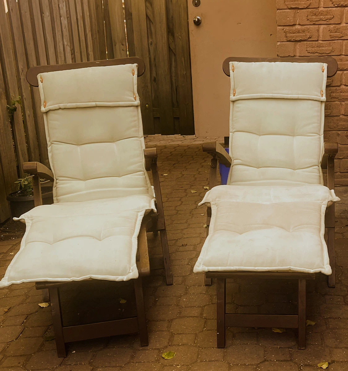 Brown Wooden Patio Chairs with Cream Cushions