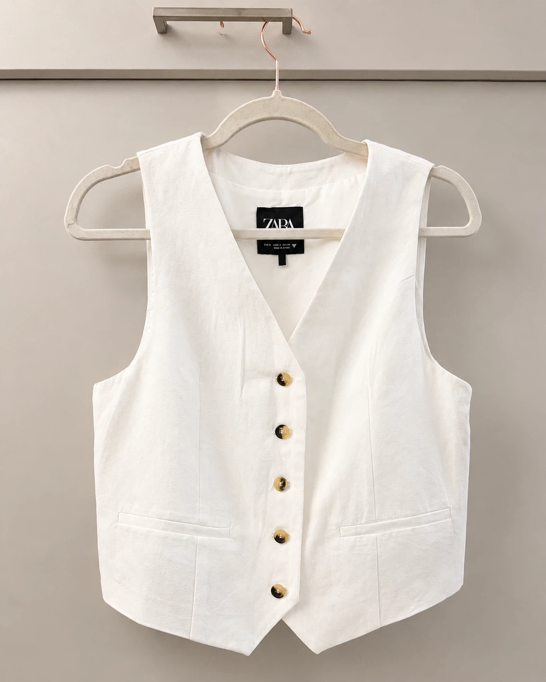 white vest