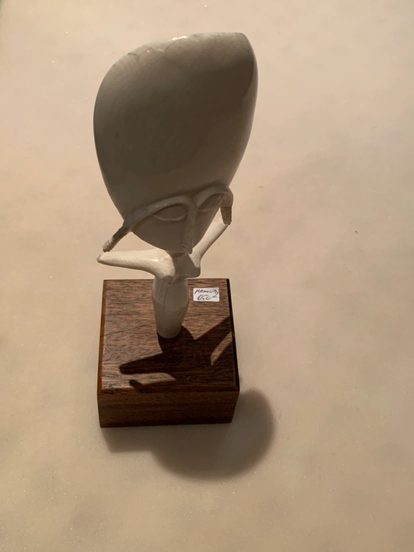 Sculpture on Wooden Base