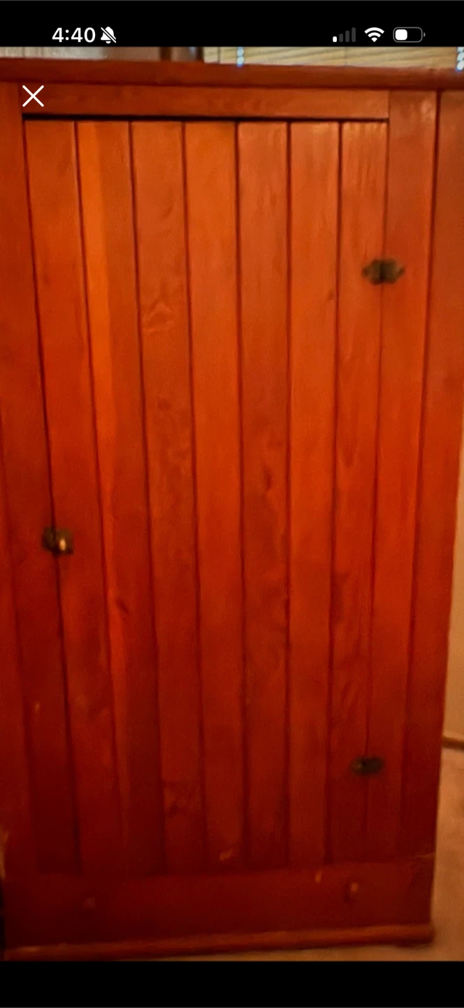 Wooden wardrobe cabinet with double doors and drawer