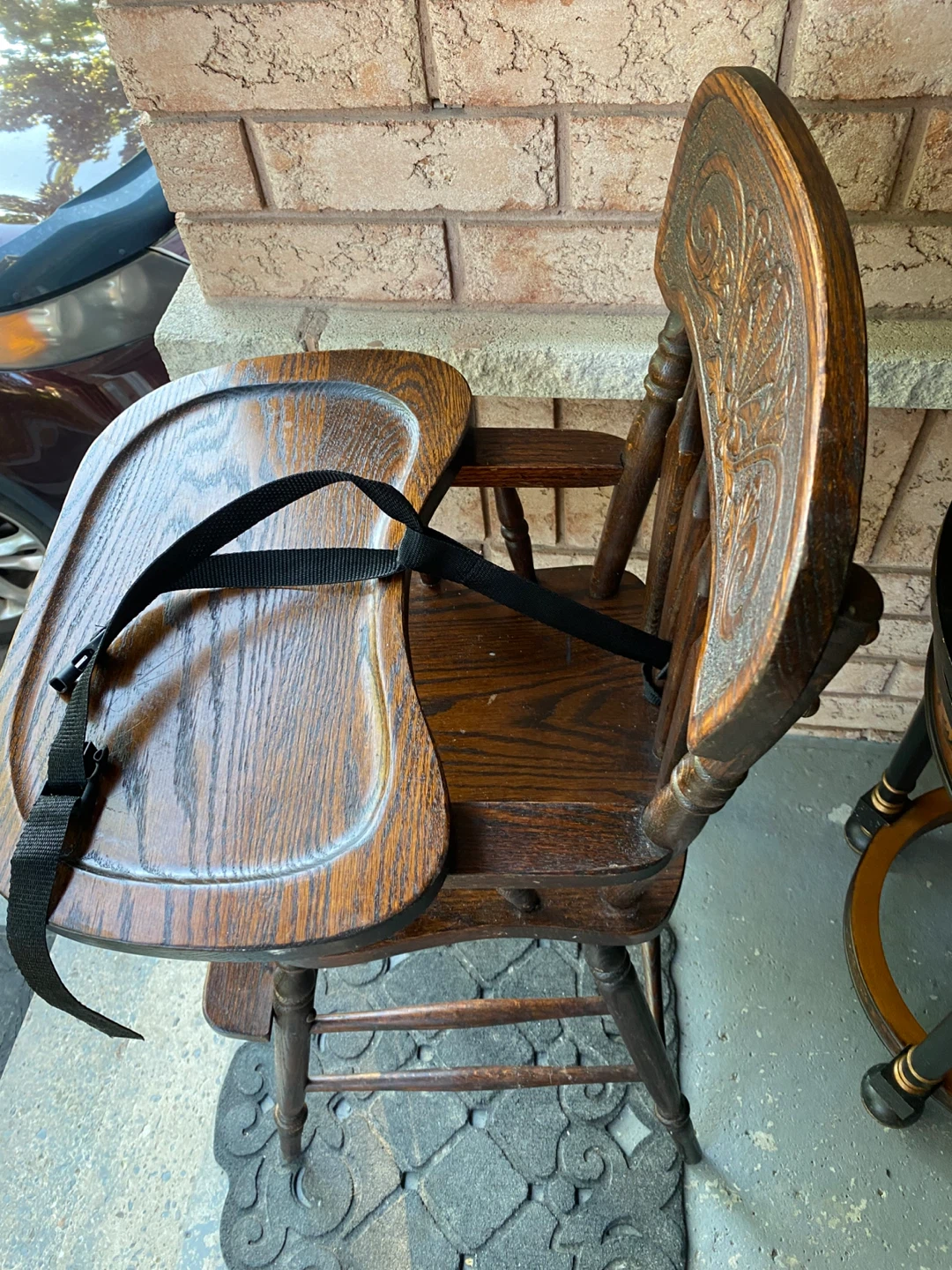 A antique baby high chair in good condition,  shows normal wear
