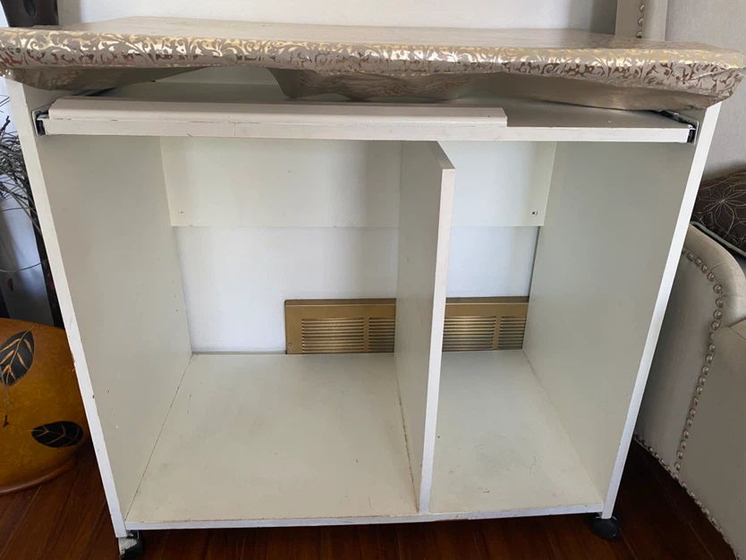 White rolling storage cabinet and box spring