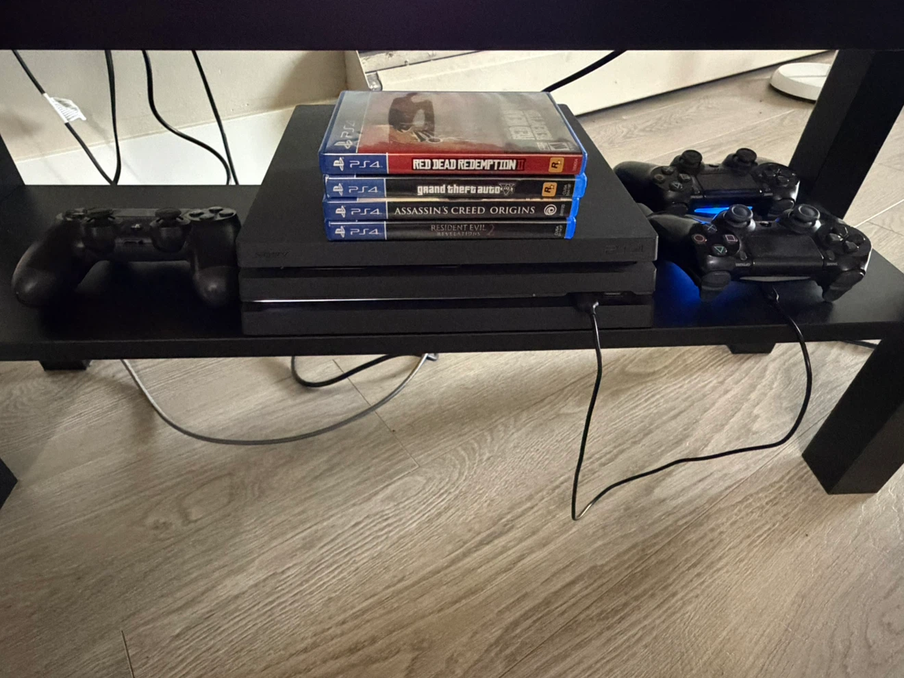 PlayStation 4 Pro 1TB Console with 3 Controllers and Games