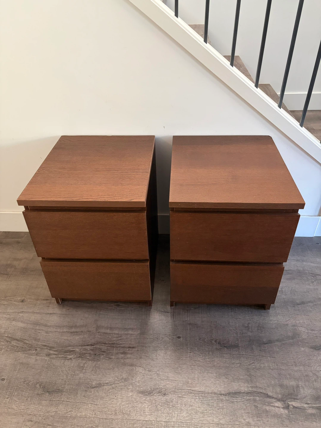 pair of IKEA MALM nightstands in brown