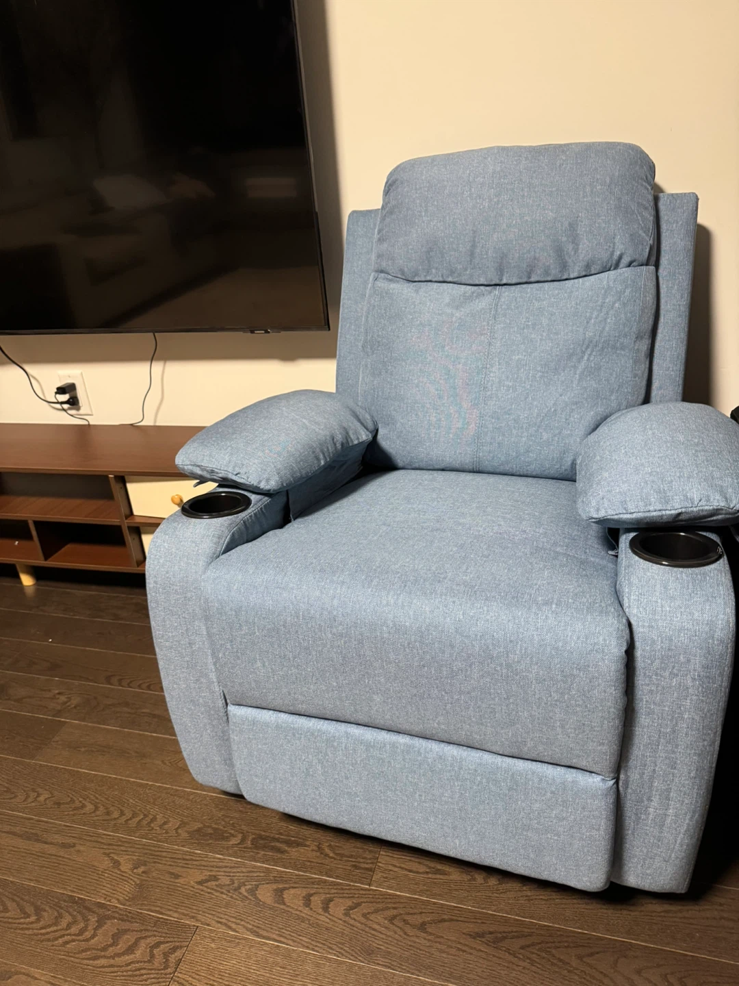 Blue upholstered recliner chair with cup holders - photo 2