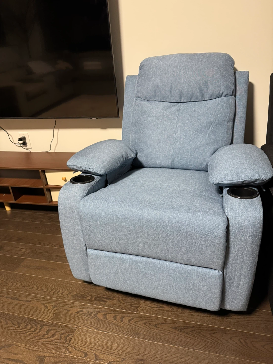 Blue upholstered recliner chair with cup holders - photo 3