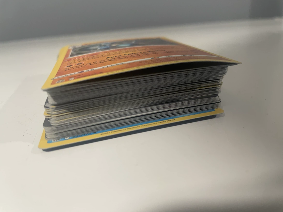 About 100 Pokémon cards