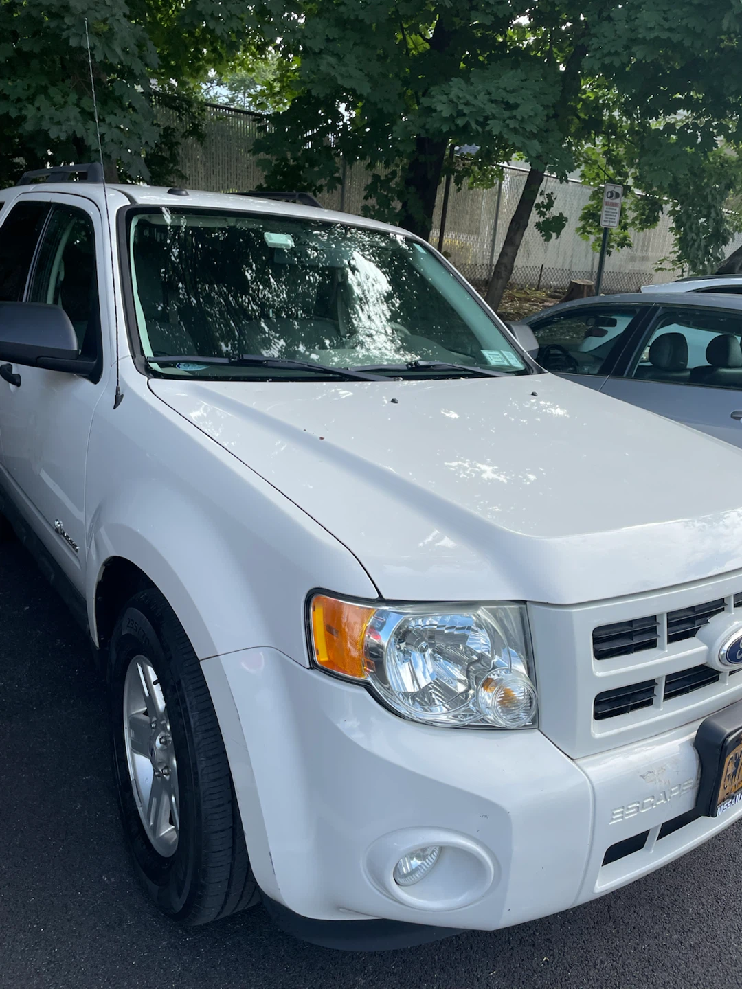 White Ford Escape Hybrid SUV