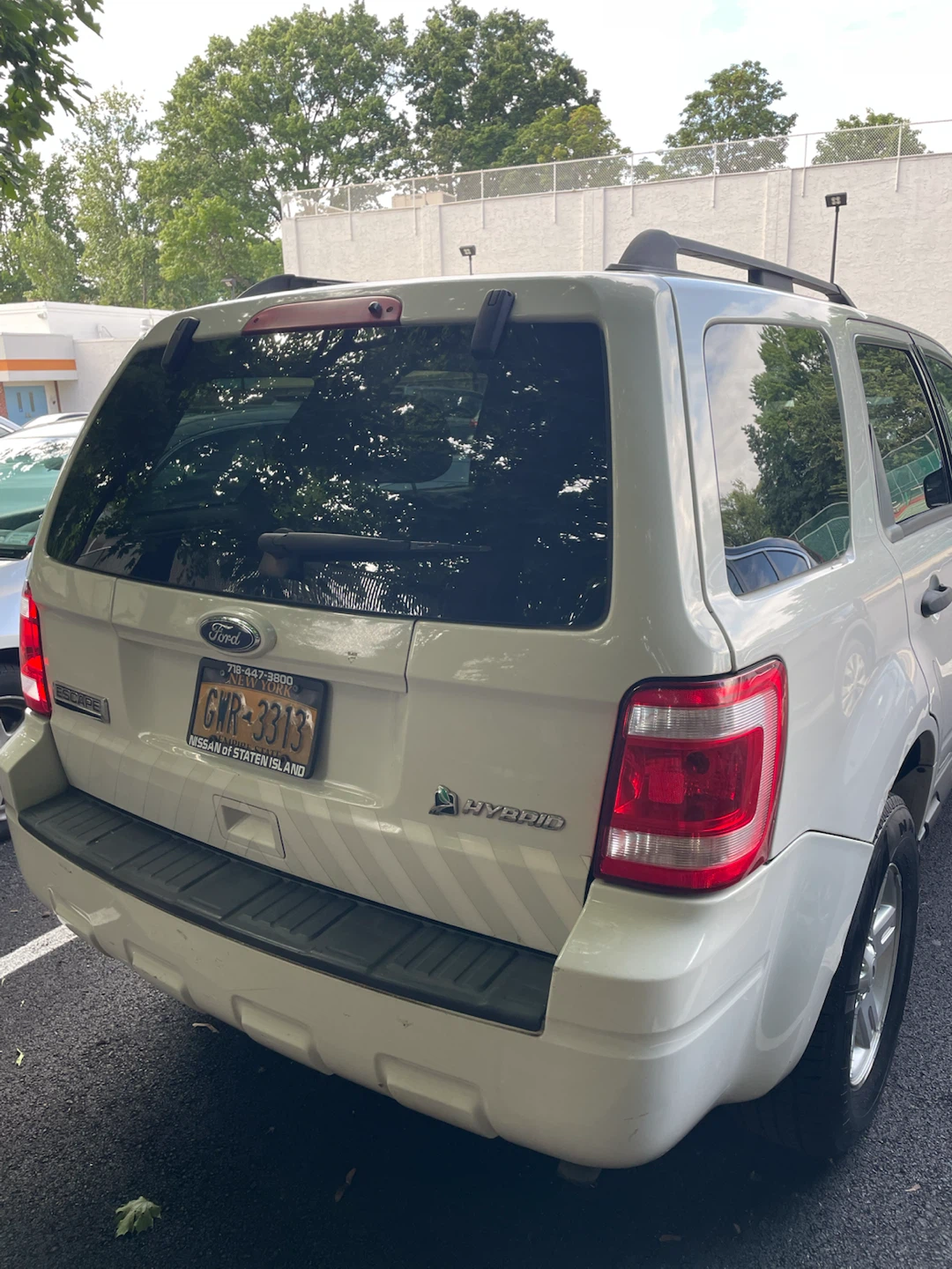White Ford Escape Hybrid SUV - photo 3