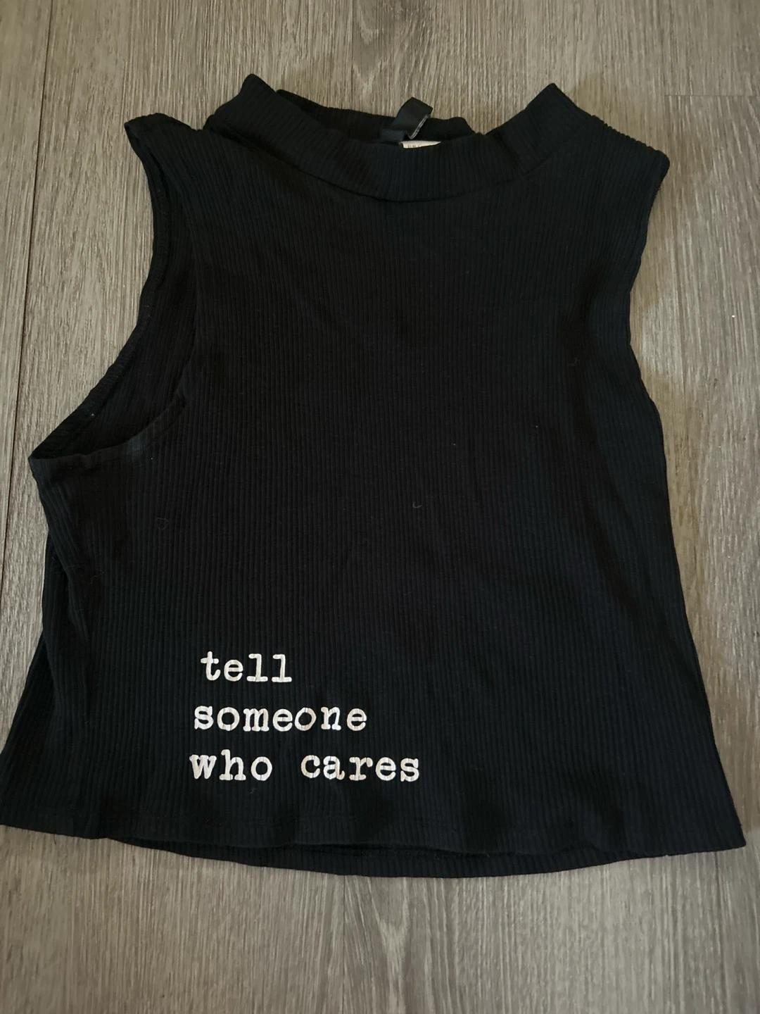 Tell someone who cares black top