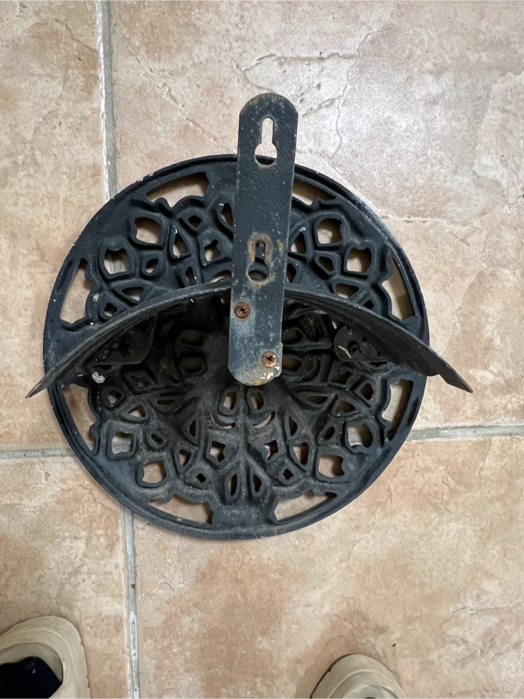 Ornate Black Cast Iron Hose Holder