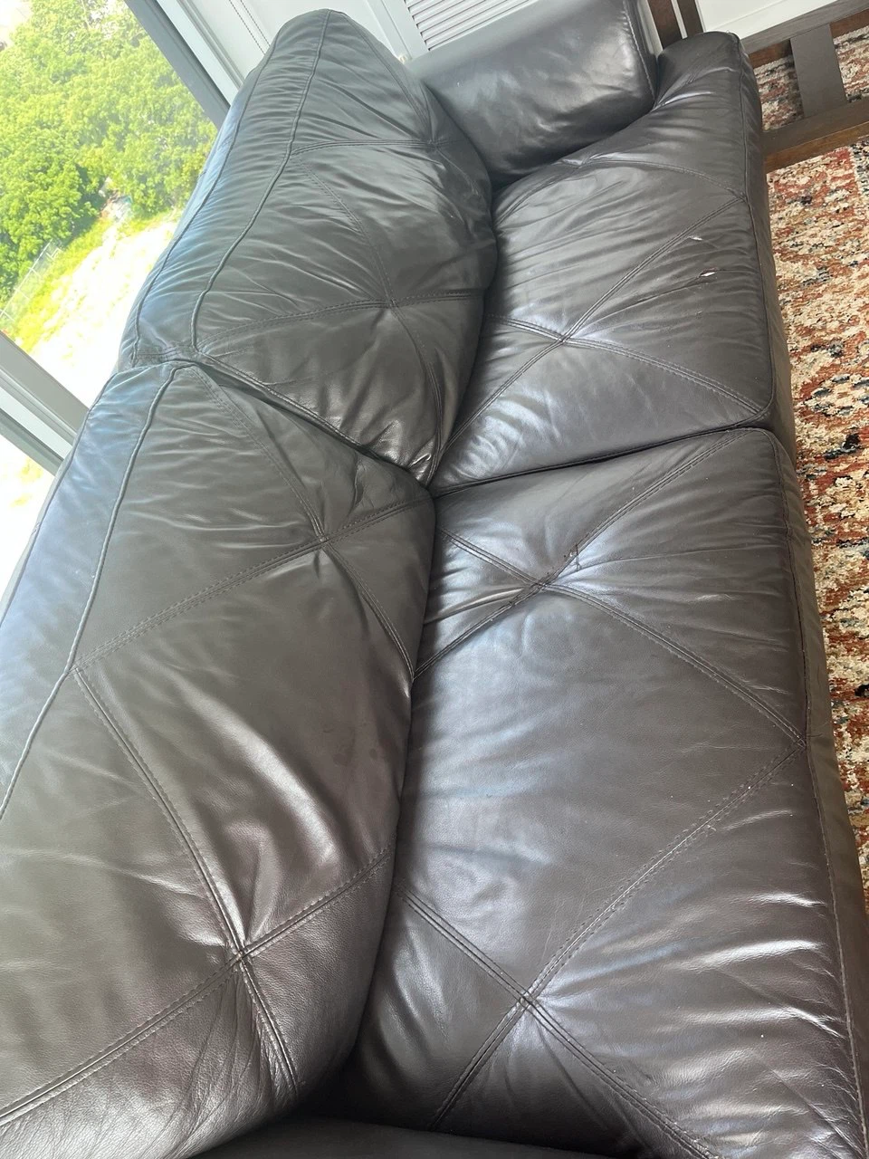 gently used leather sofa and loveseat
