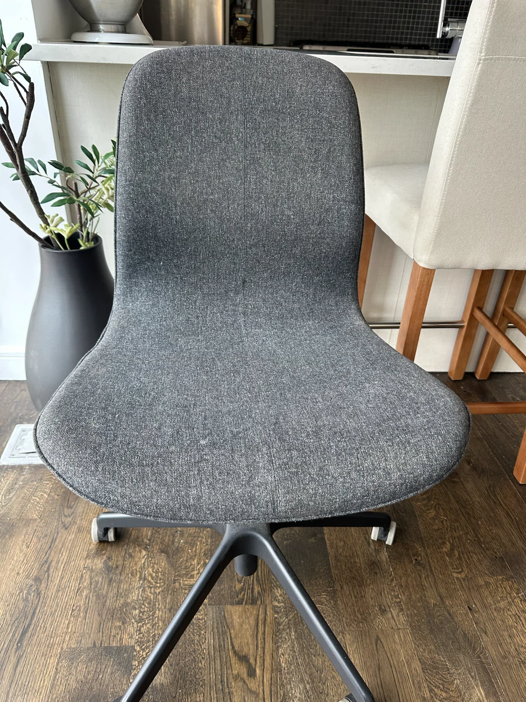 Grey swivel chair
