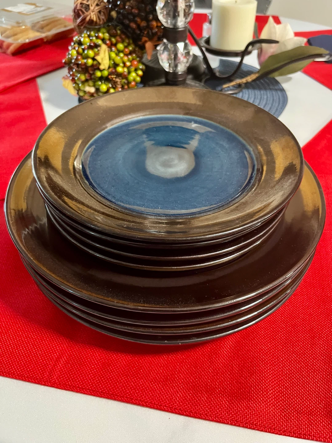 Stack of 8 Brown and Blue Ceramic Plates