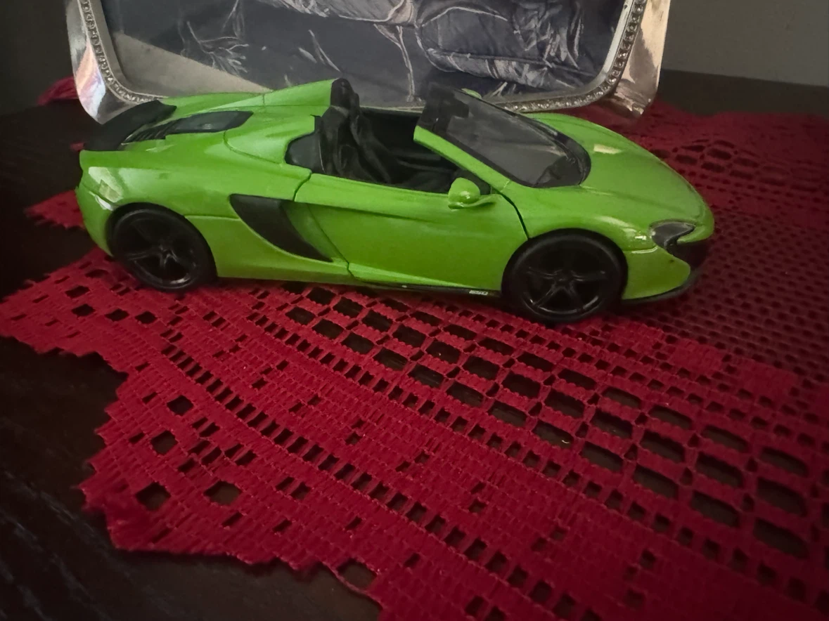4 Diecast Cars. 1/24th scale. $10 each