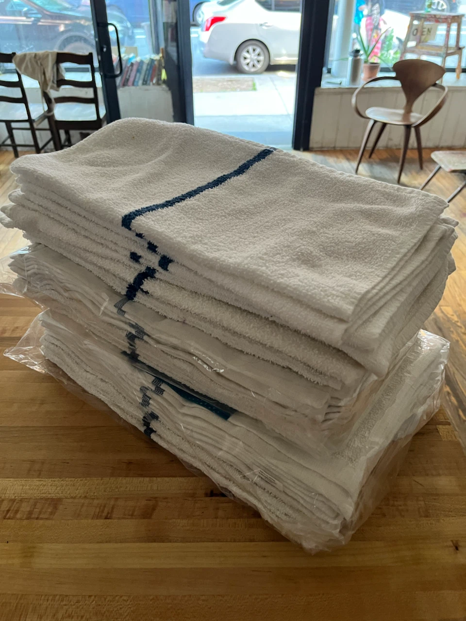 Stack of White Dish Towels with Blue Stripe