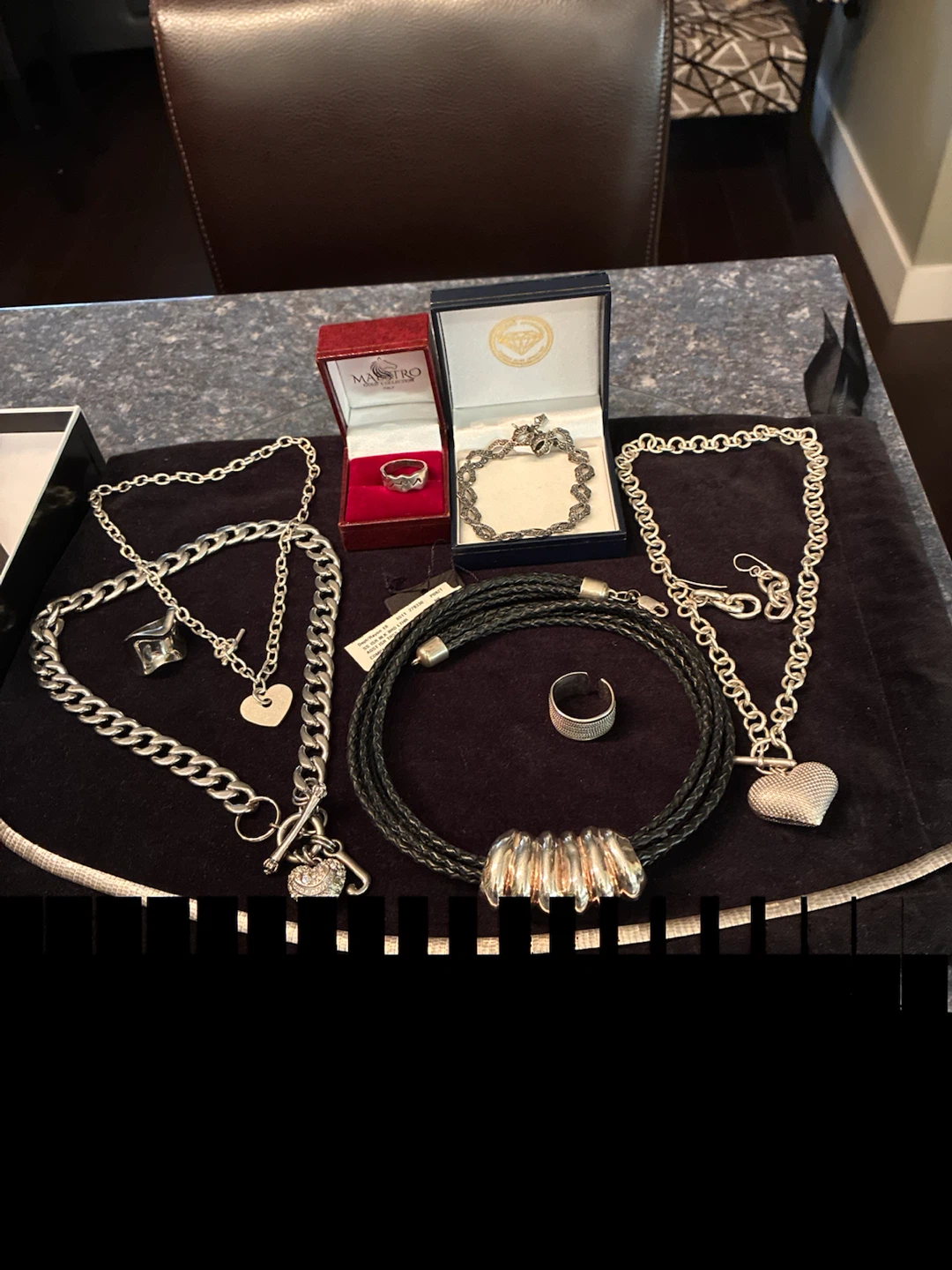 Silver Tone Necklace, Bracelet, and Ring Set