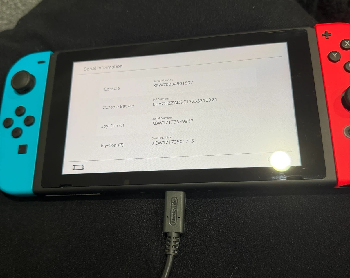 Nintendo Switch Bundle V2  (Includes Mario Kart 8) - photo 2