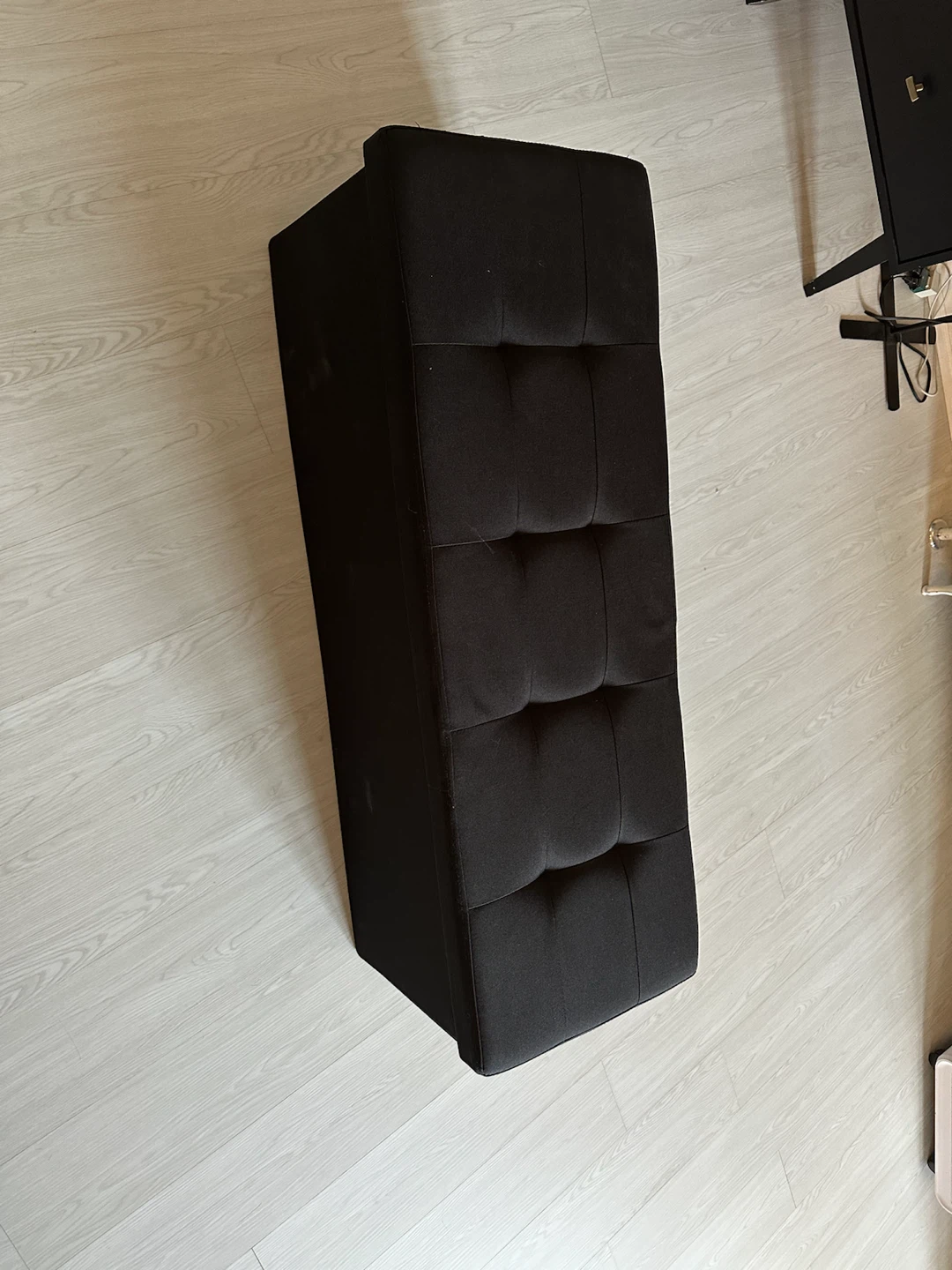 Black Upholstered Storage Ottoman