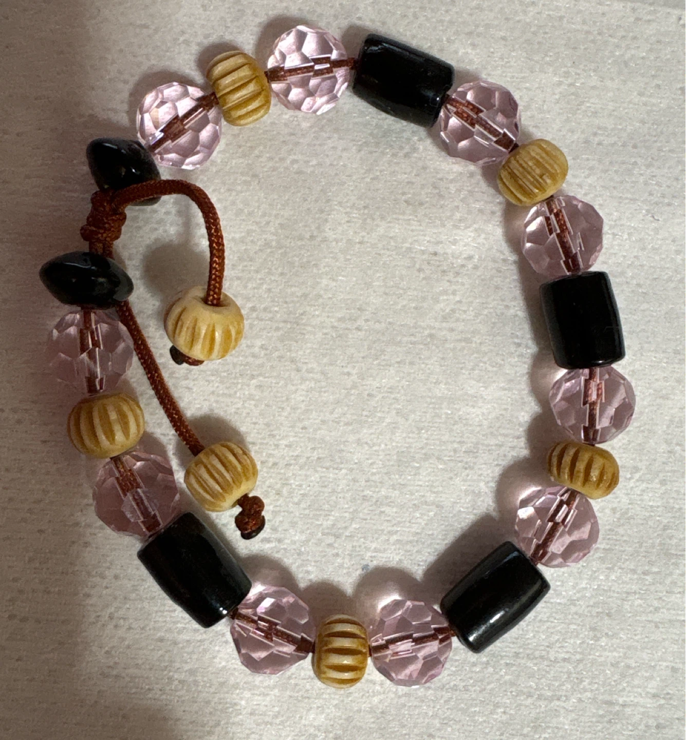 Beaded Bracelet with Pink, Black, and Tan Beads