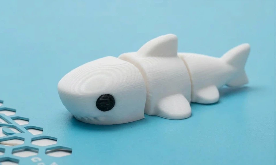Cute articulated white shark ( the eyes are white)