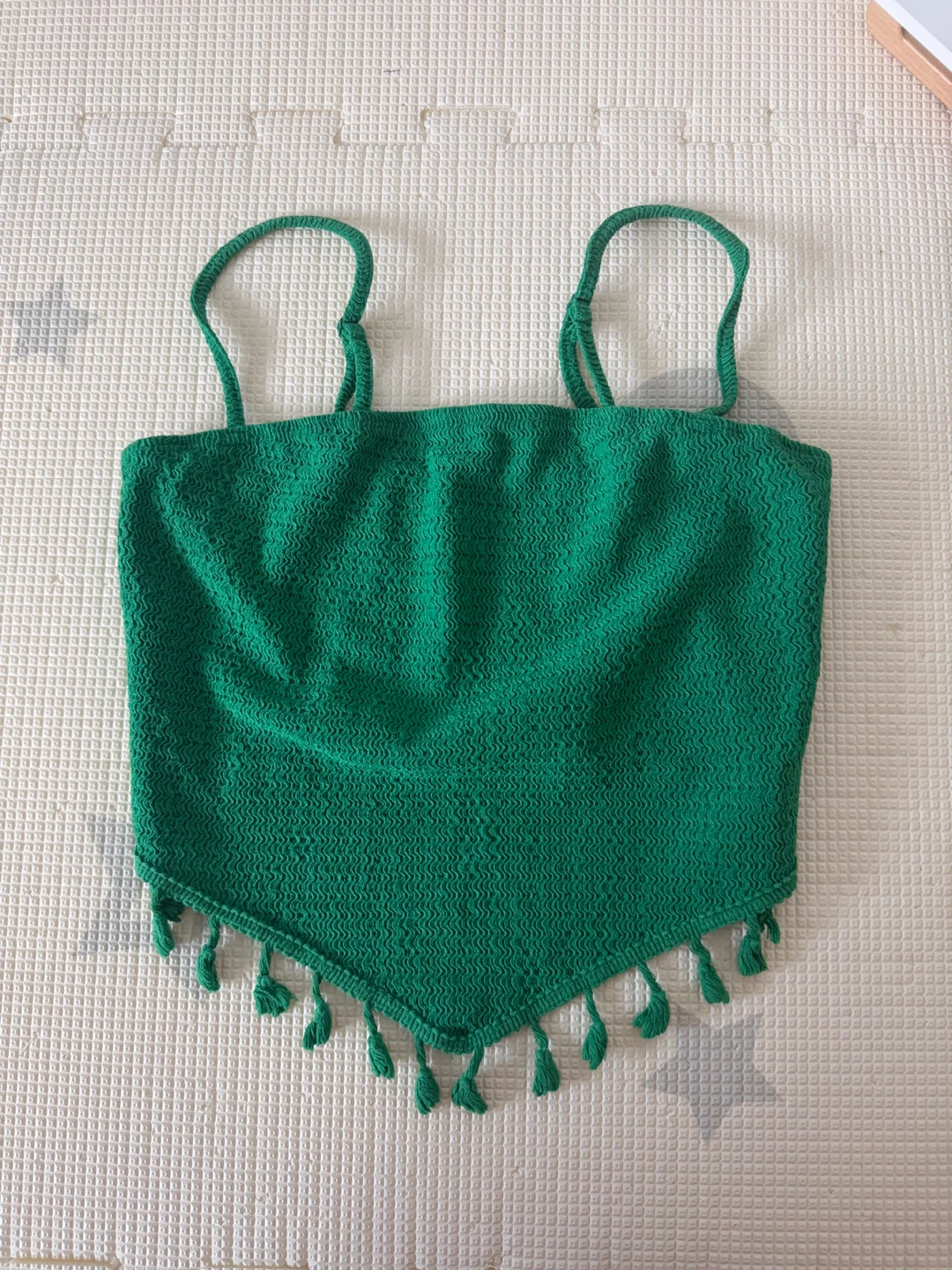 Green textured crop top with tassels