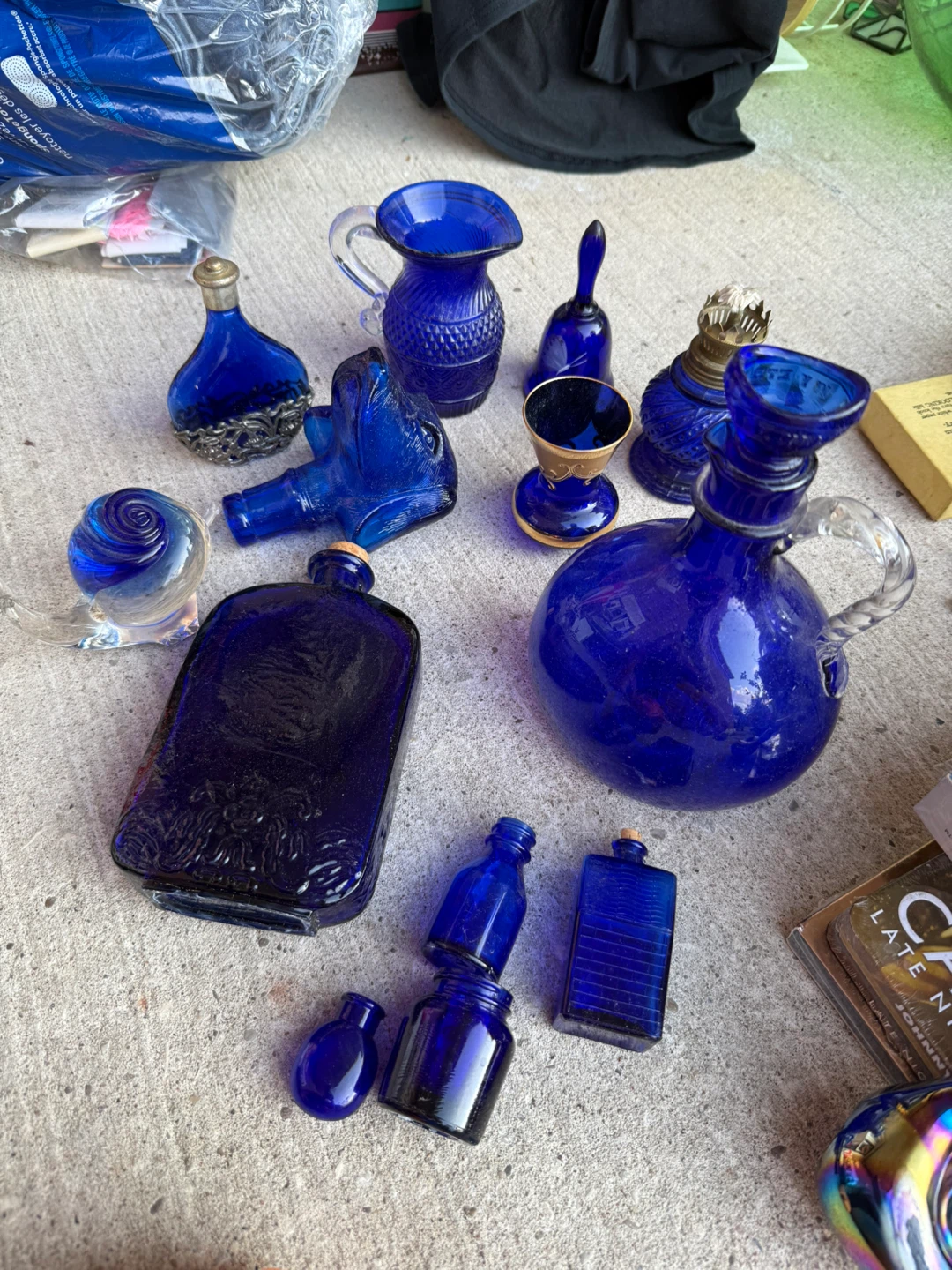 Collection of Blue Glass Bottles and Vases