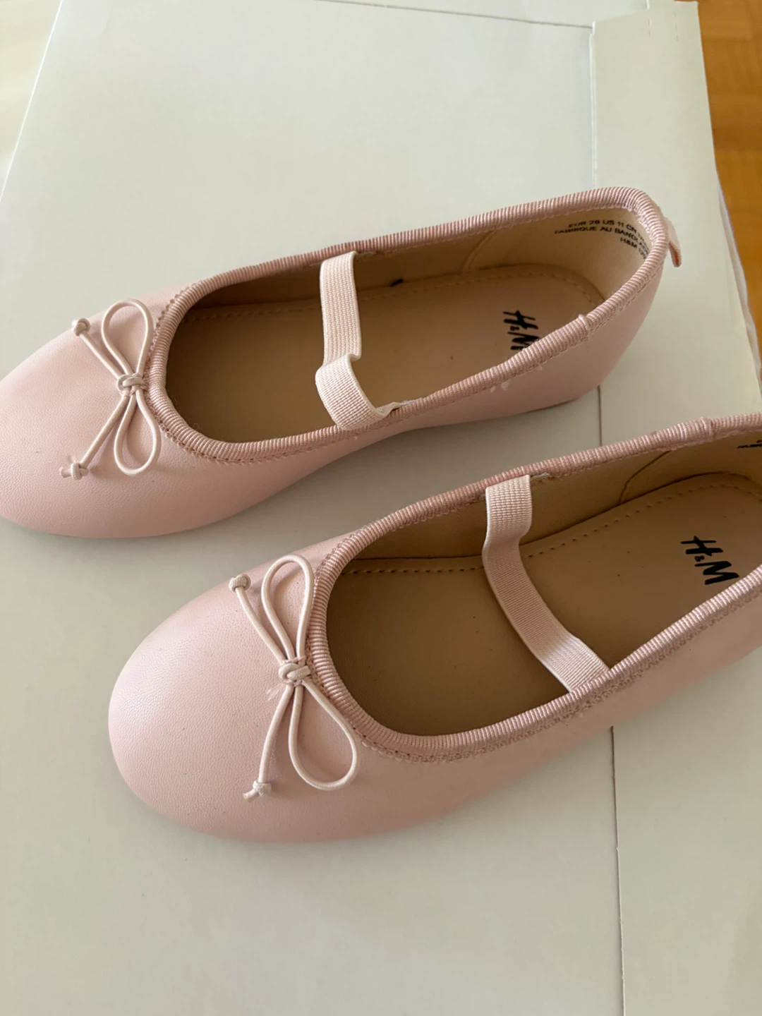 Pink ballet flats with elastic strap