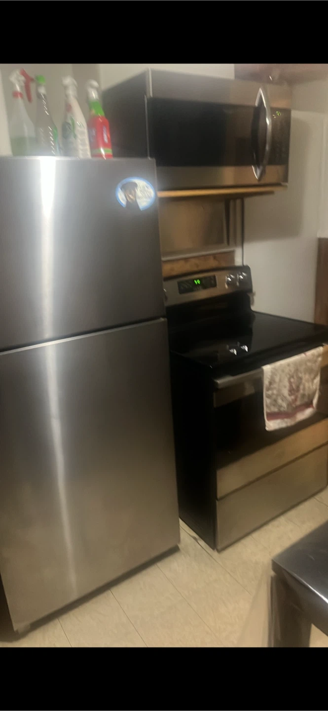 Stainless Steel Fridge and Stove and Microwave