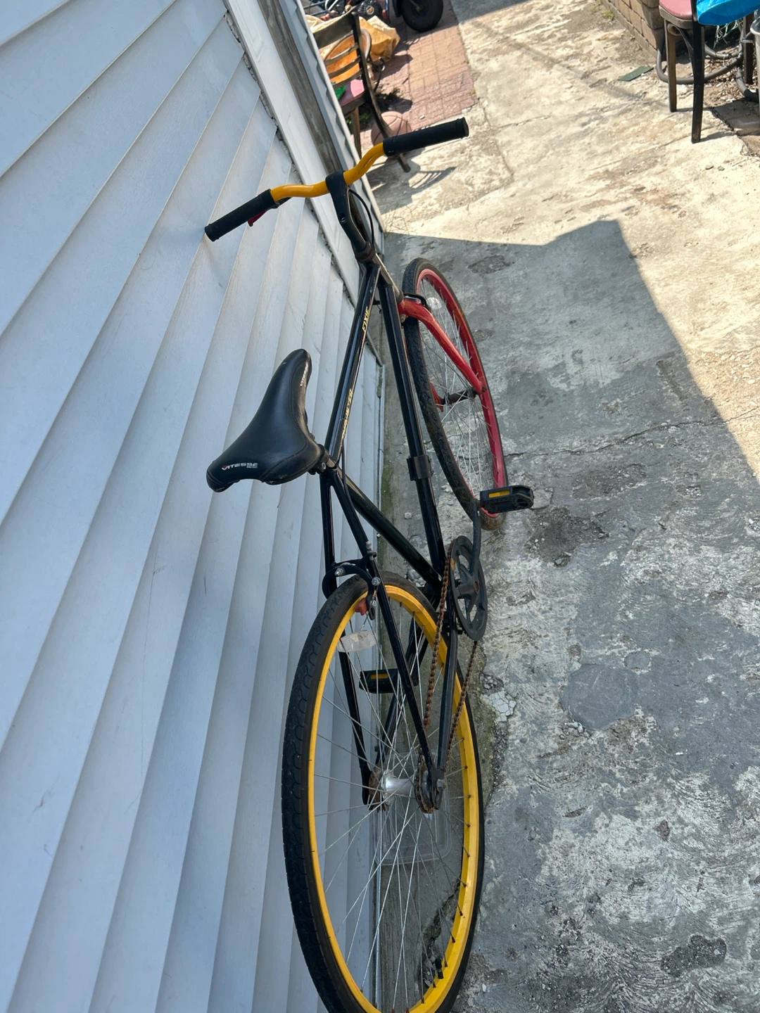 Black Fixie Bike with Yellow and Red Rims