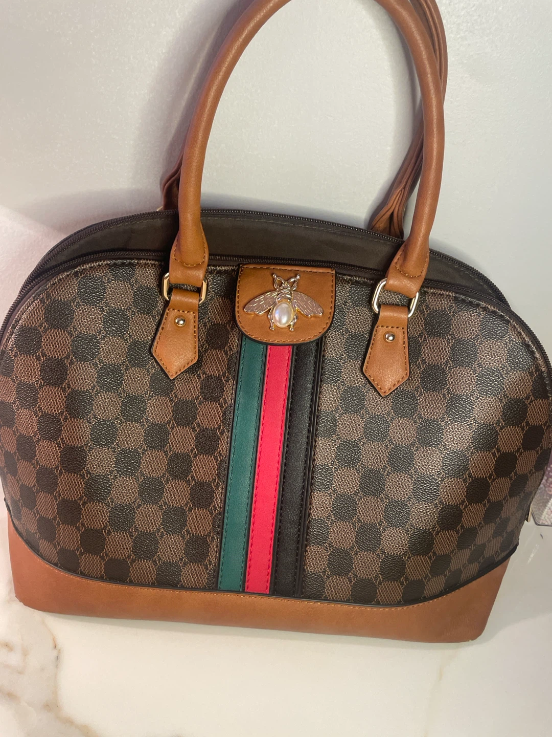Brown checkered satchel with bee accent