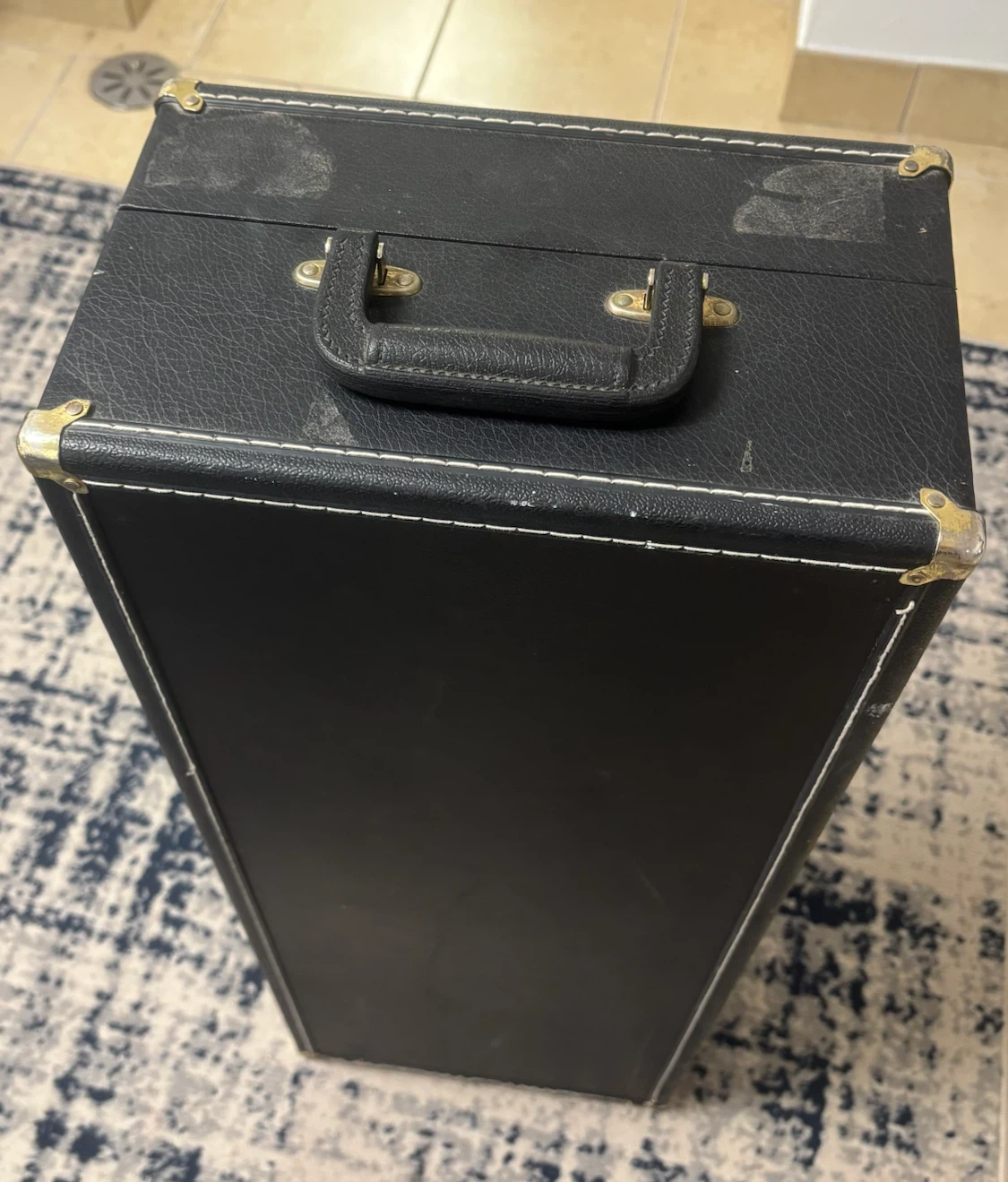 Black hard-shell tenor saxophone case