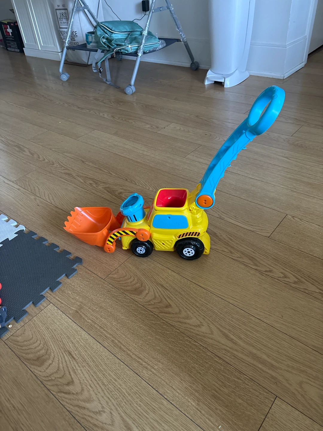 Yellow and Blue Toy Dump Truck with Scoop