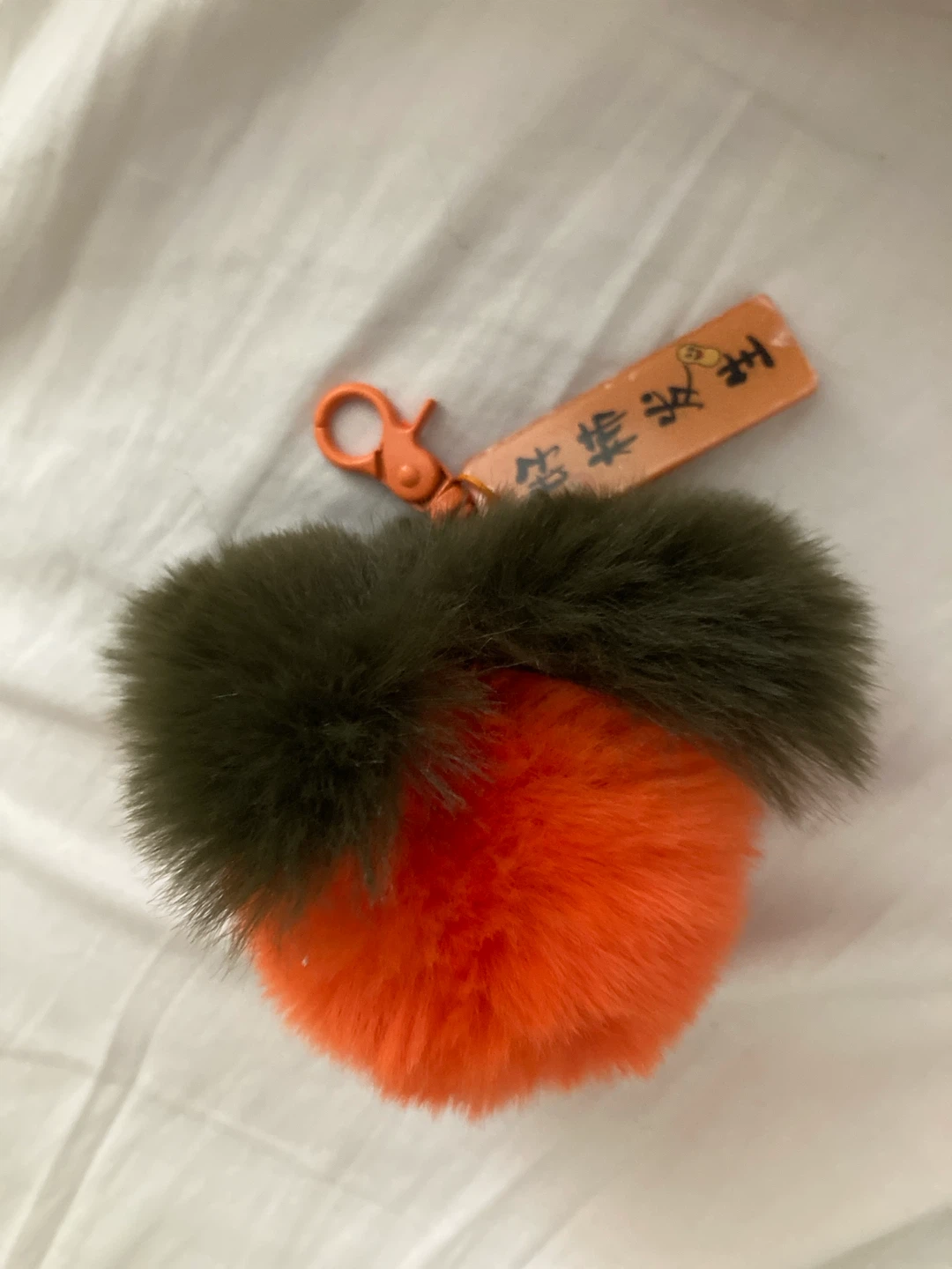fluffy tangerine/clementine keychain