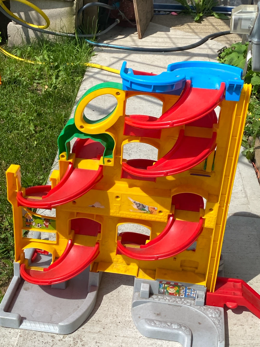 Fisher-Price Little People Wheelies Stand 'n Roll Hero Garage