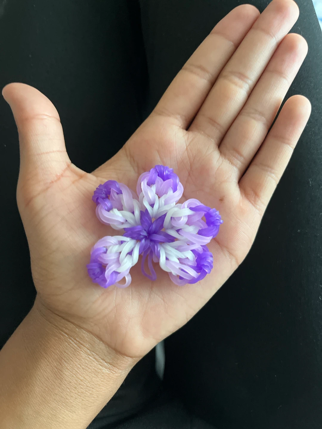 Purple and white rainbow loom hibiscus flower