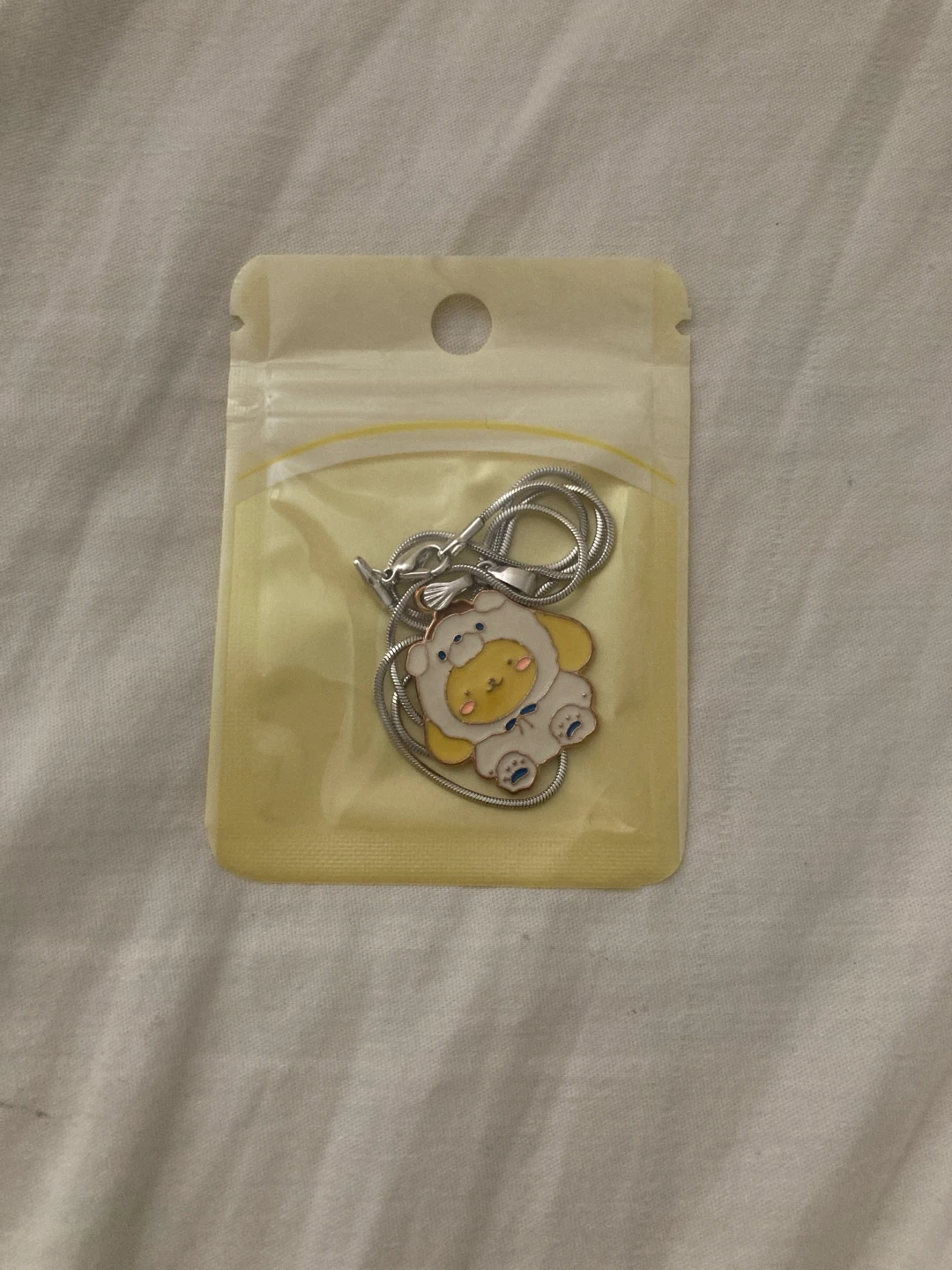 sealed sanrio pompompurin necklace (doesn't tarnish)