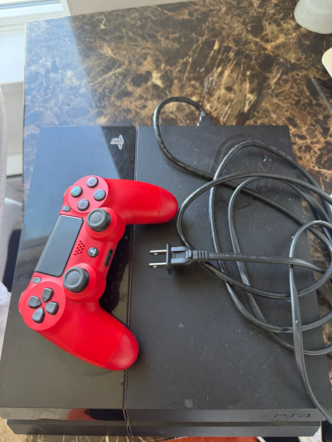 Sony PlayStation 4 (PS4) with Red Controller