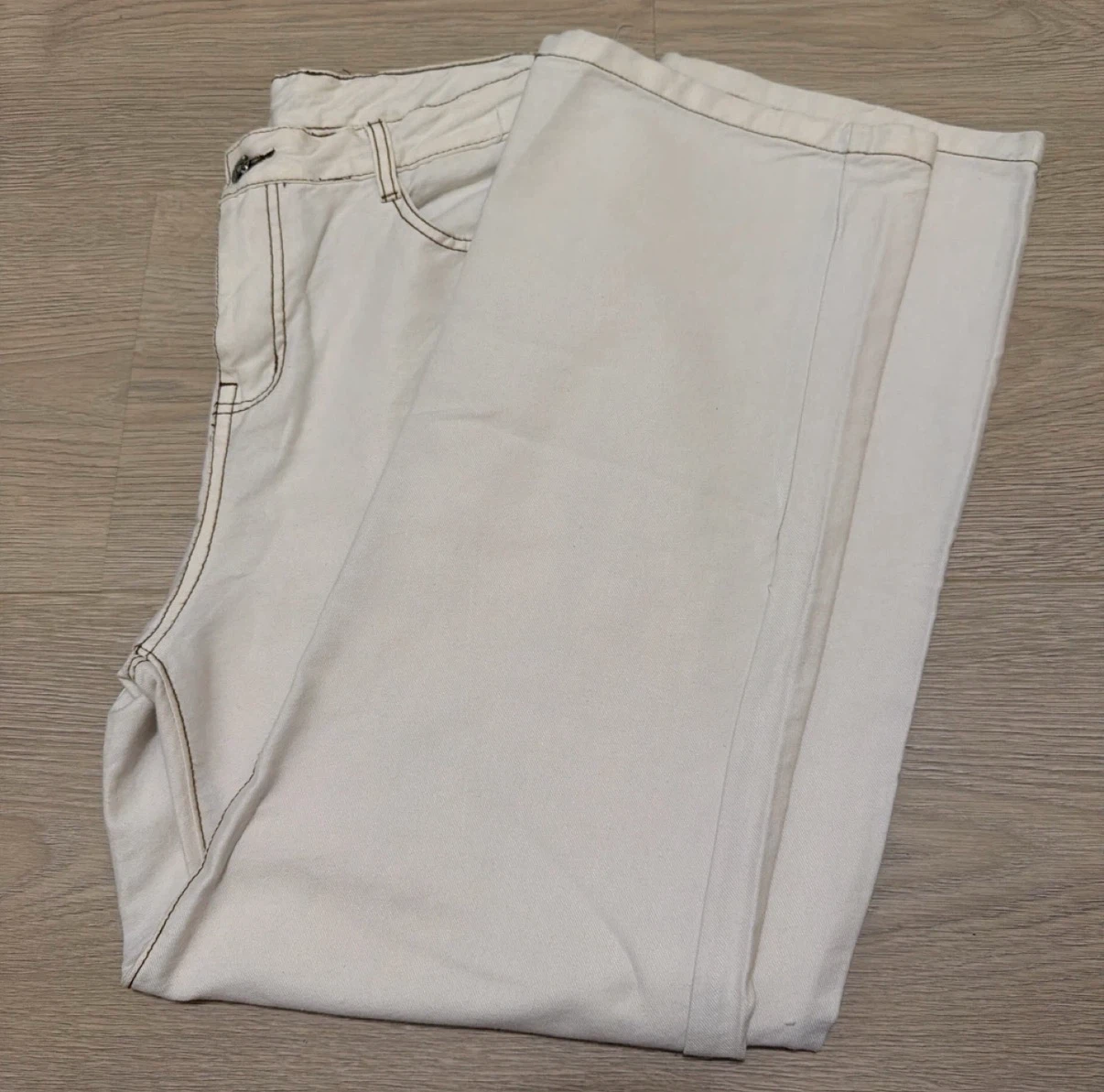 Cream coloured wide-leg jeans