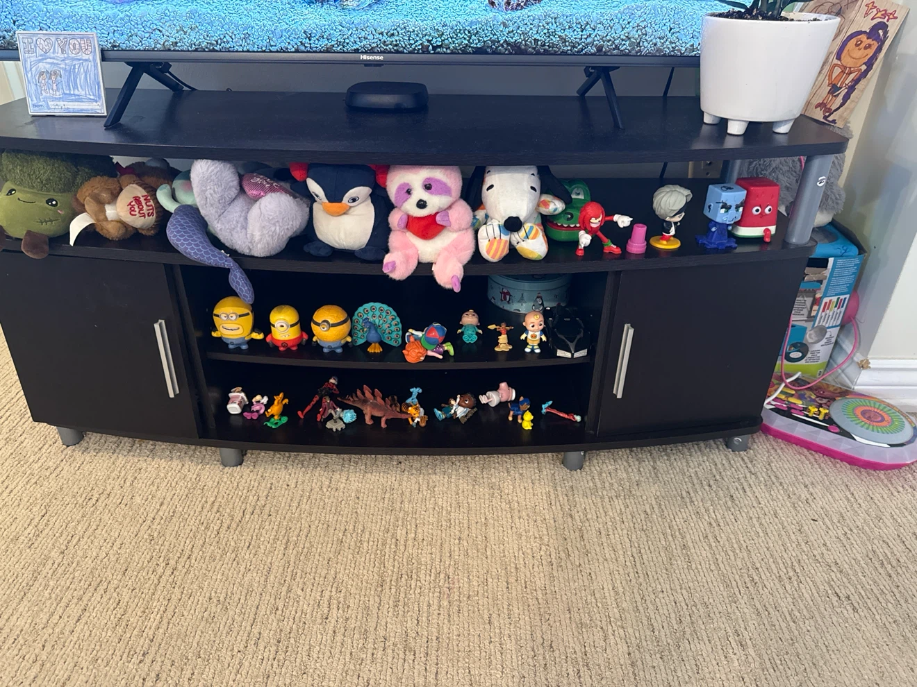 Black TV Stand with Many Collectible Figurines - photo 2