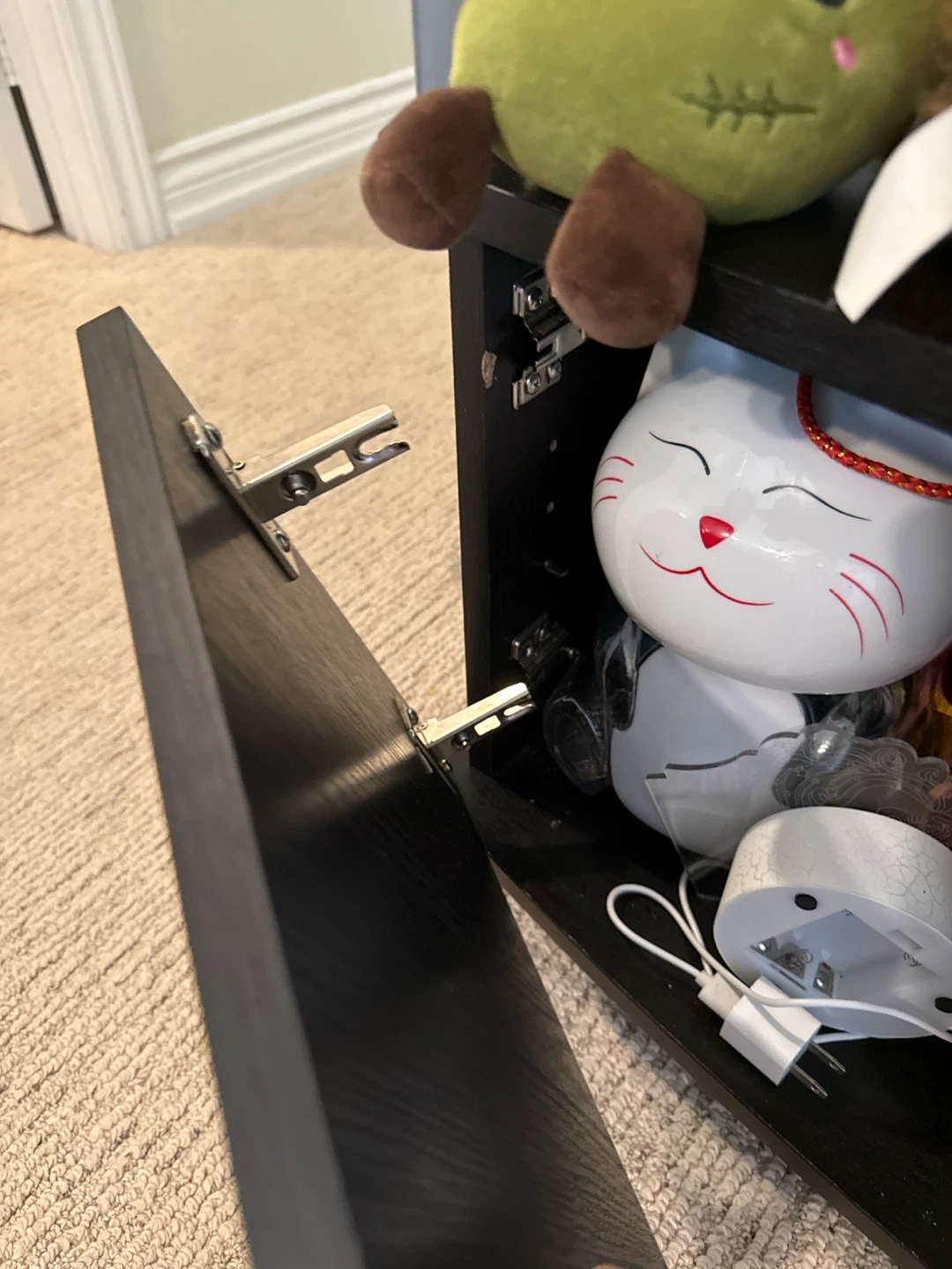 Black TV Stand with Many Collectible Figurines - photo 3