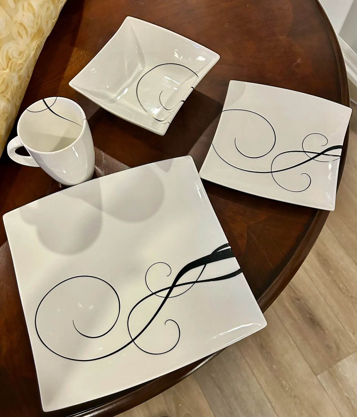 4-Piece White Ceramic Dinnerware Set with Black Swirls