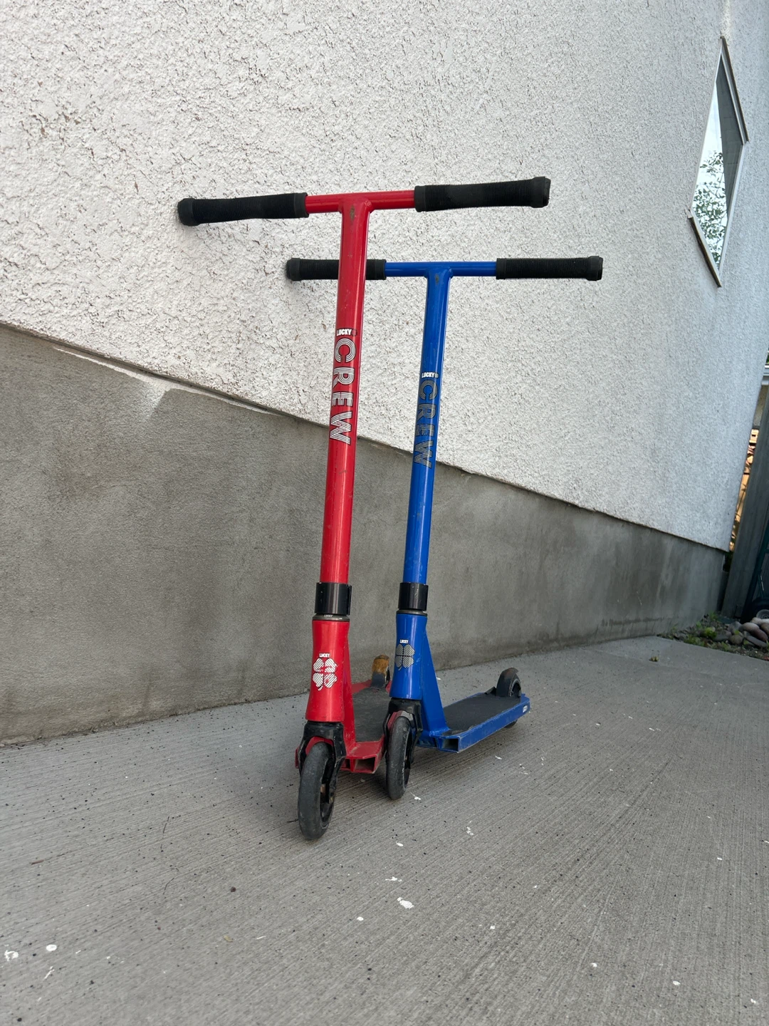 Two Lucky Crew complete pro scooters