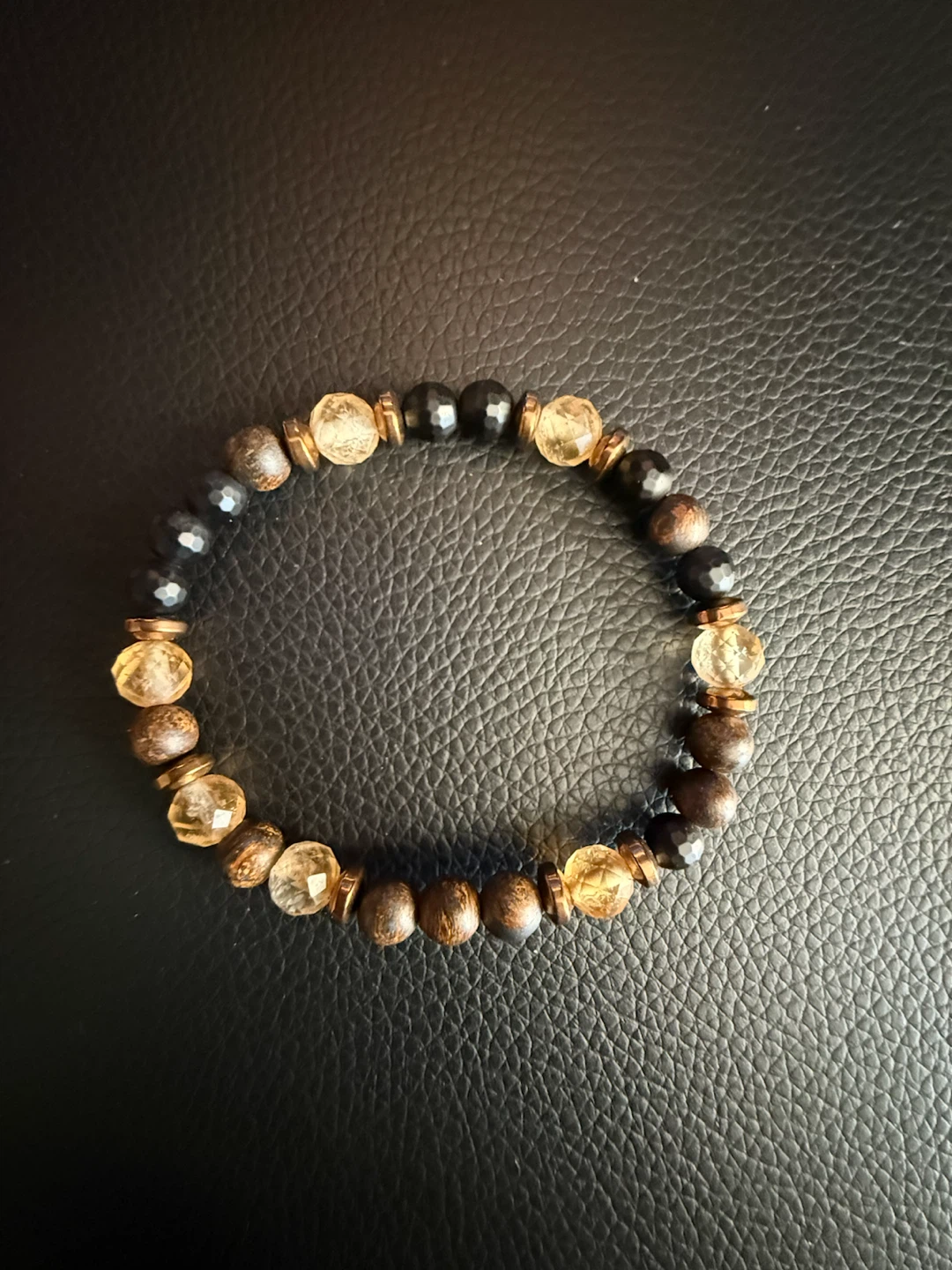 Locally made, hand bored gems with Morse code embedded