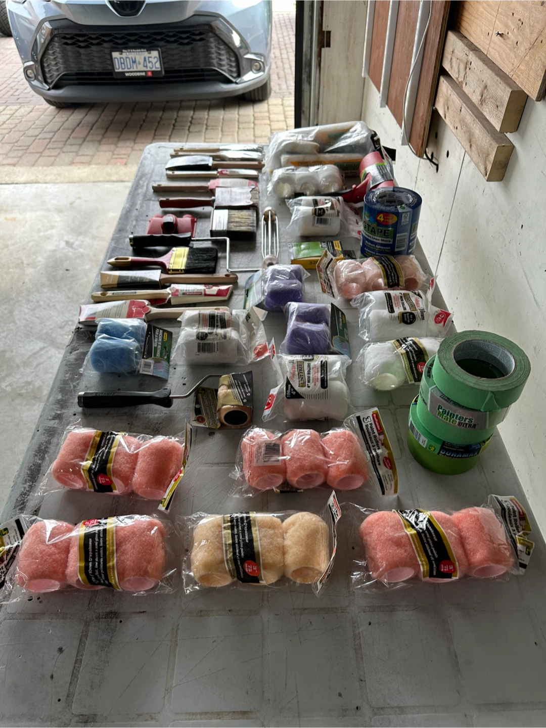 Painting supplies: brushes, rollers and tape