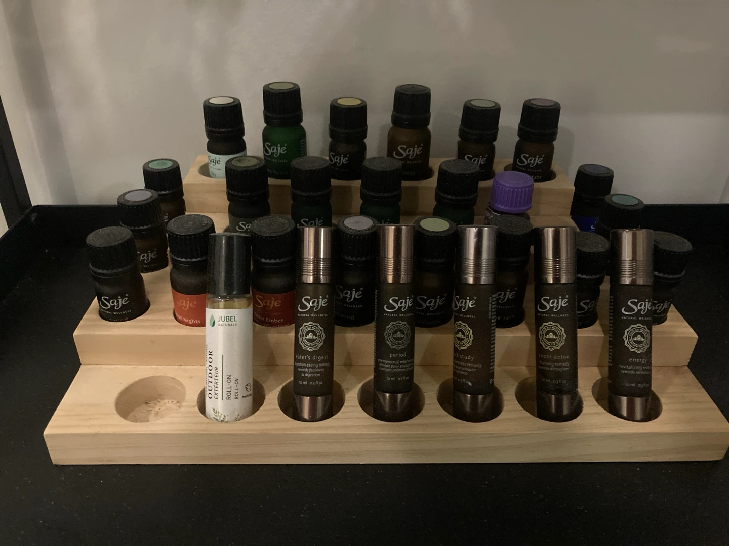 Saje Essential Oils Collection with holder
