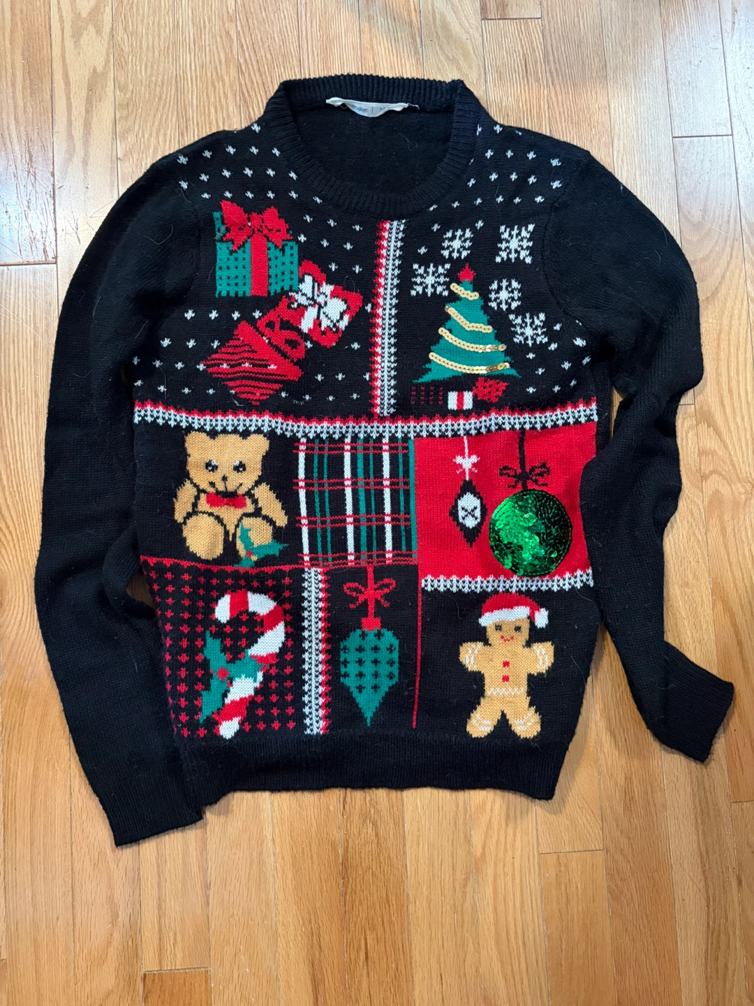 Black Christmas Sweater with Holiday Motifs